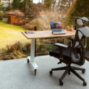 Empty office chair with laptop representing a planned new employee hire