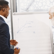 Executives discussing financial charts