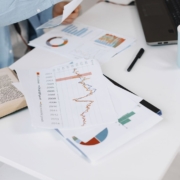 Financial charts on desk