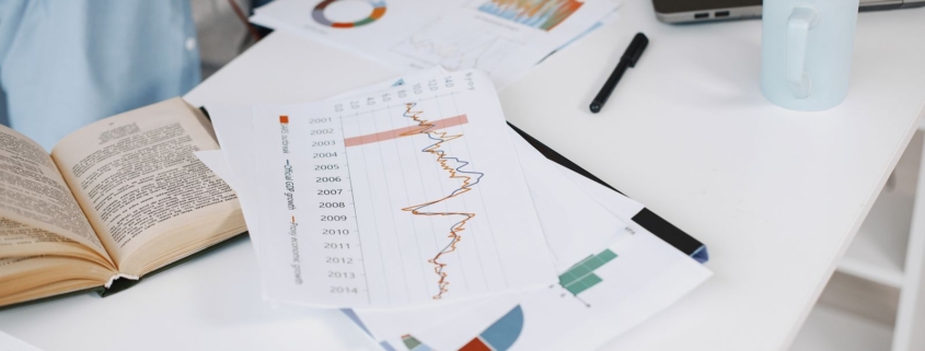 Financial charts on desk
