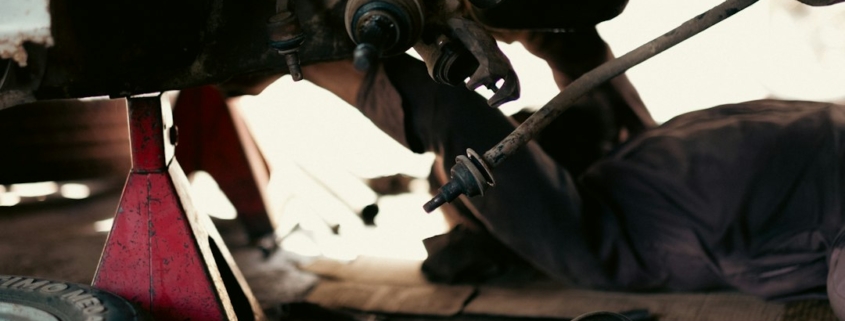 Automotive technicians working in a service workshop