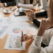 Team reviewing charts — Pexels Senior finance leadership team reviewing charts and planning future CFO succession